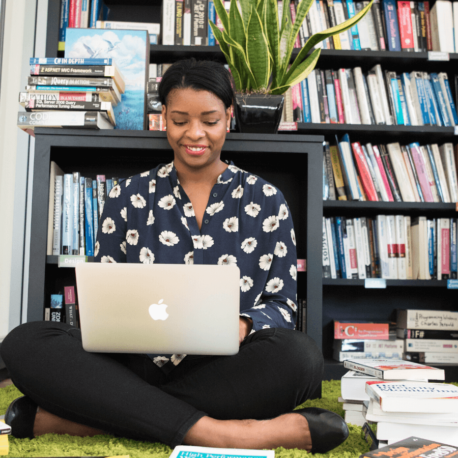 woman typing on laptop